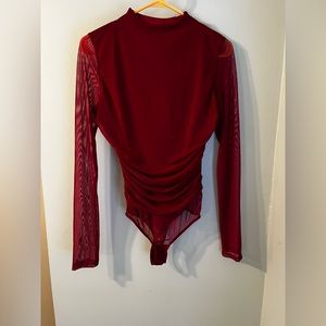 Size small body suit NWT